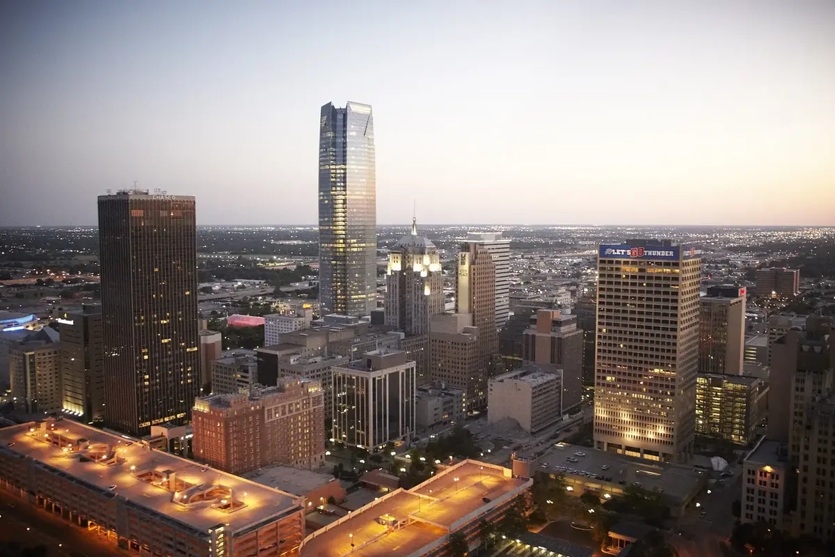 Downtown Oklahoma City skyline at twilight: the head-office city of BancFirst